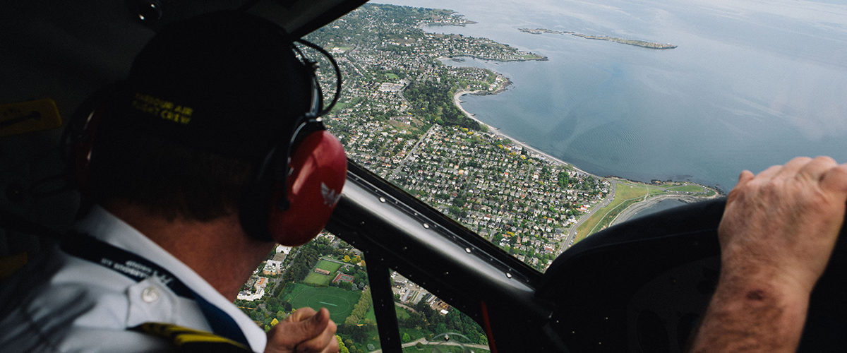 Aerial shot from inside a plan looking down at Victoria below 