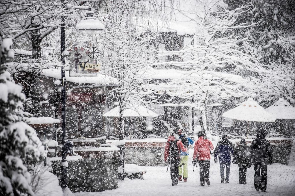 Strolling through Whistler Village on a snowy day.