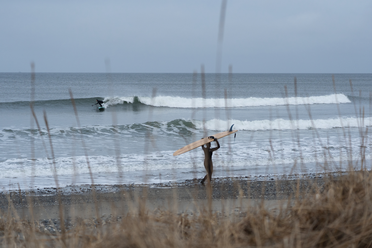 Surfing in Naikoon Provincial Park, near Masset, Haida Gwaii. | John Scarth